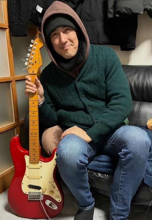 Jesse with guitar